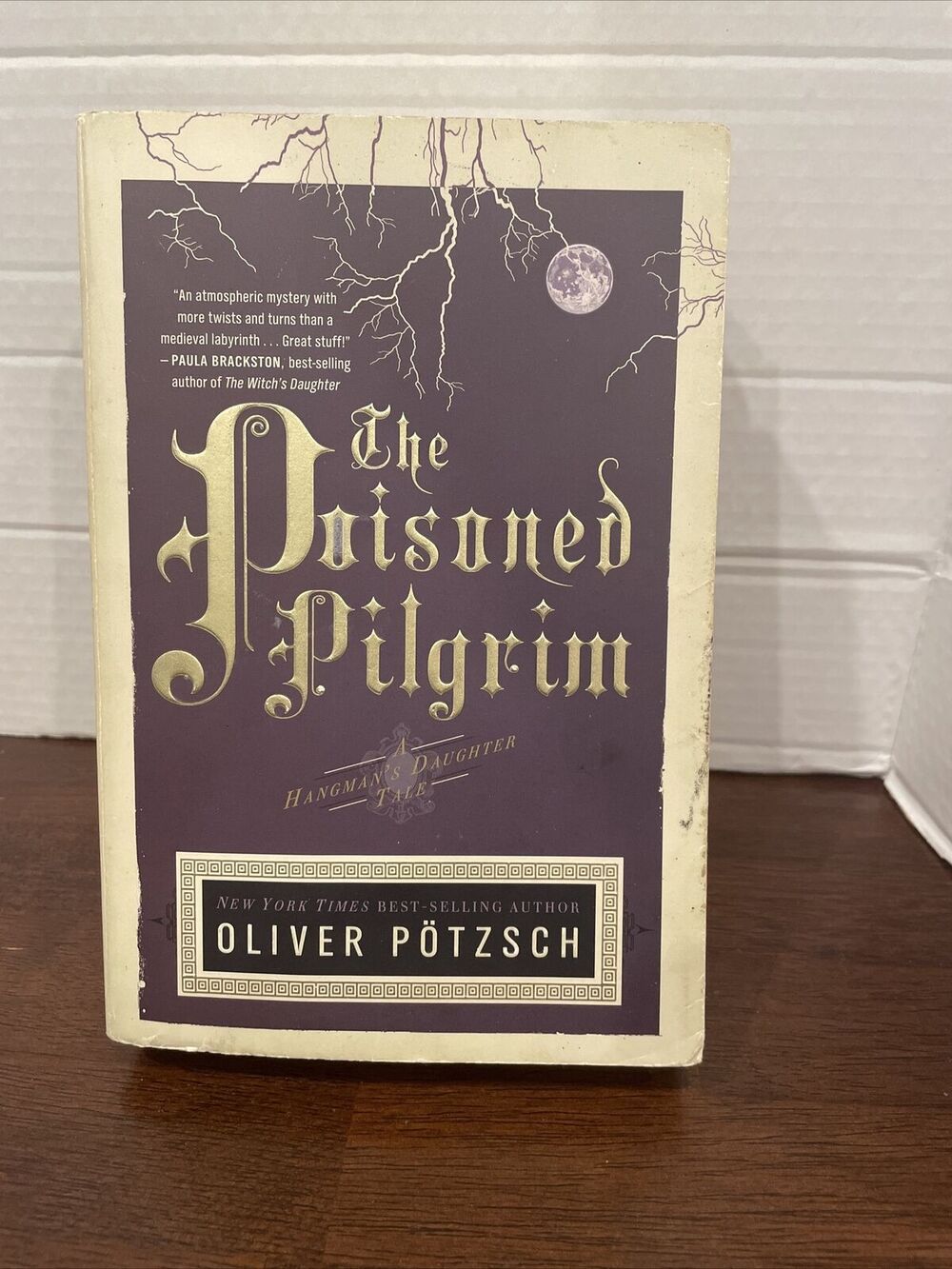 The Poisoned Pilgrim [US Edition][A Hangman's Daughter Tale] by Potzsch, Oliver